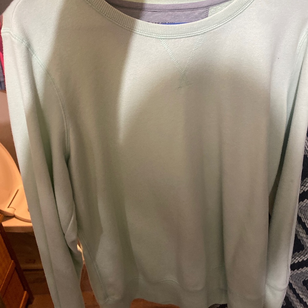 It is a green long sleep shirt